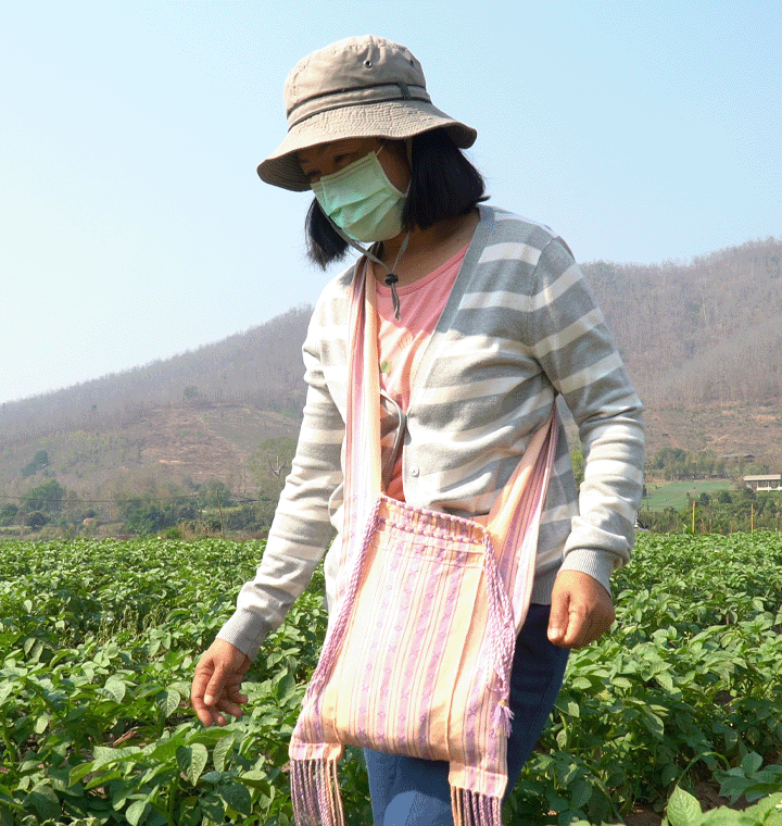 Female farmer out in a field